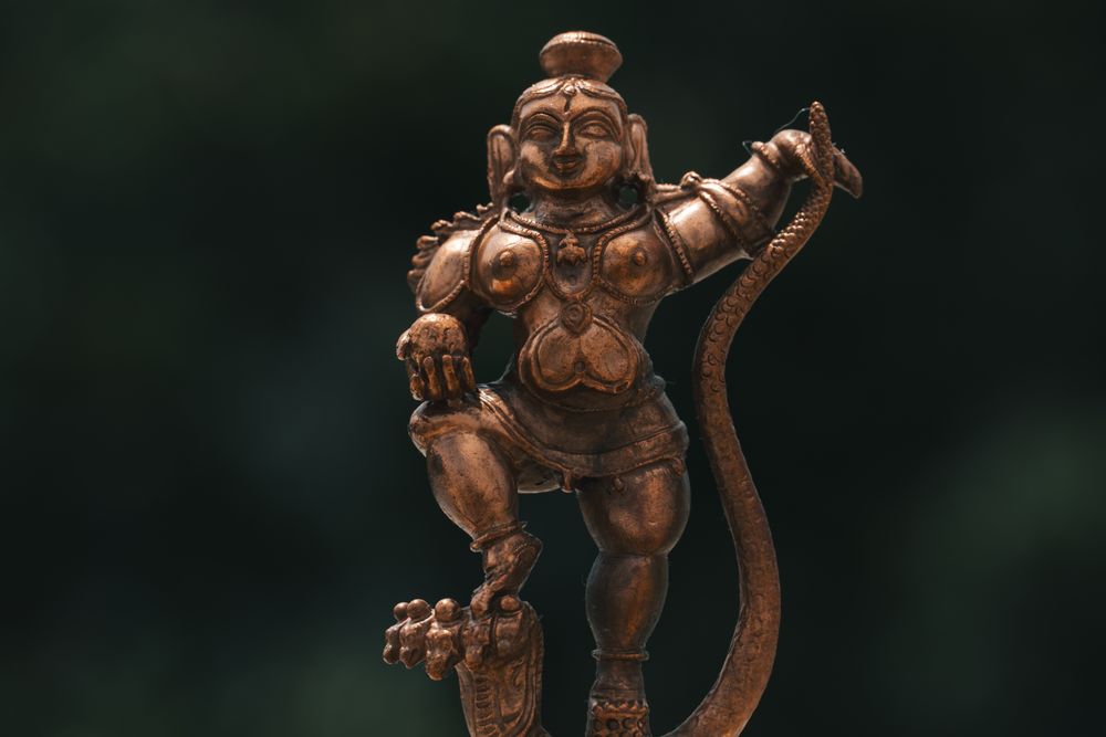 A brass statue of a Hindu deity